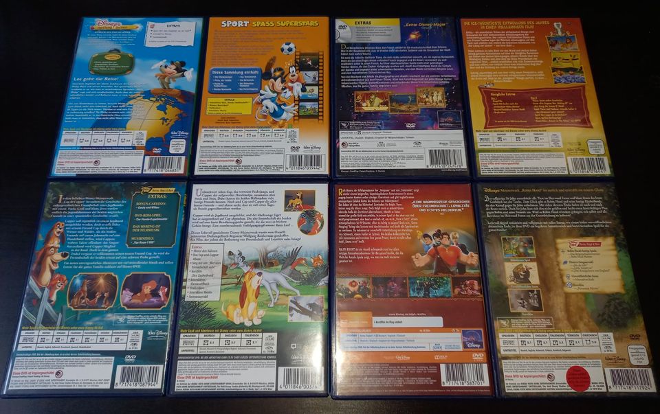 8 Walt Disney DVD Filme - Cap und Capper, Robin Hood, Micky Maus in Bocholt