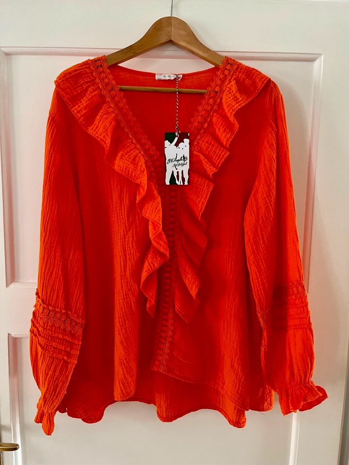 Neue Musselinbluse in orange in Schriesheim