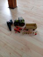 Siku Control Claas Axion + Geräte + Fernbedienung Niedersachsen - Braunschweig Vorschau