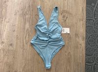 Zara Body Top Shirt Bodysuit mit Raffung Gr XS-S hellblau NEU Berlin - Wilmersdorf Vorschau