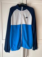 Nike Joggingjacke (Gr. L) in blau/weiß Nordrhein-Westfalen - Remscheid Vorschau
