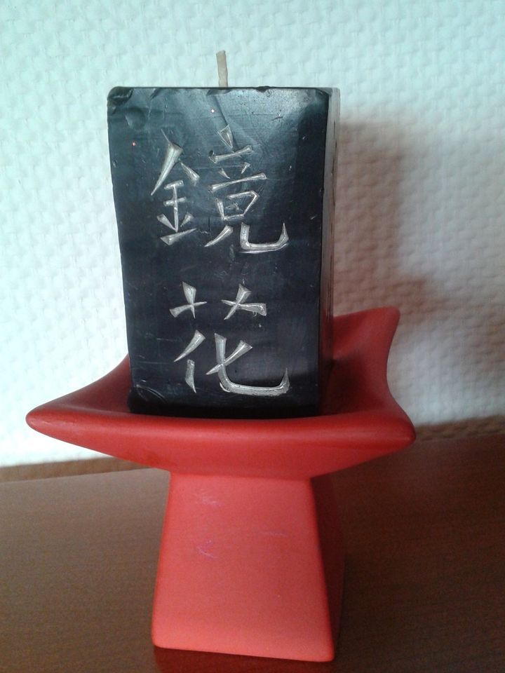 Kerze mit japanischen Schriftzeichen in Pirmasens