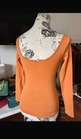 Wolford Shirt rückenfrei Rundhals orange nahtlos S 36 Hessen - Kassel Vorschau