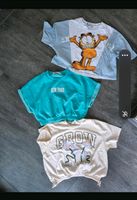 3 tolle Mädchen T-Shirts Gr. 164 u.a. "Garfield" Nordrhein-Westfalen - Minden Vorschau