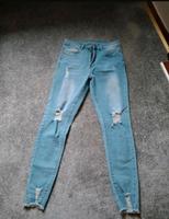 Jeanshose schmale Jeans mit Riss hoher Dehnung ungesäumten Saum Kreis Pinneberg - Appen Vorschau