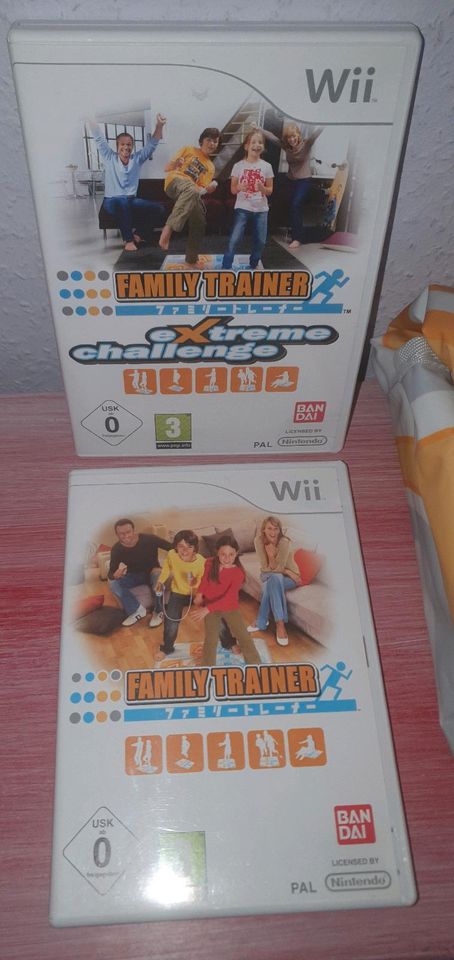 Family Trainer mit Matte und 2 Spiele Nintendo Wii in Rätzlingen bei Haldensleben