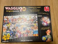 WASGIJ Puzzle Nr.28 Originalpuzzle Dropping the weigth 1000 Teile Nordrhein-Westfalen - Steinfurt Vorschau