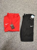 Nike Trainingsanzug Dri-Fit rot schwarz Damen Gr. M Neu Hessen - Sulzbach Vorschau