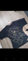 Nike Shirt schwarz Frauen Gold y2K vintage M Gröpelingen - Oslebshausen Vorschau