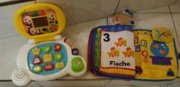 Spielzeug: Laptop von Vtech, Stoff-Musikbuch von FisherPrice Nordrhein-Westfalen - Niederzier Vorschau