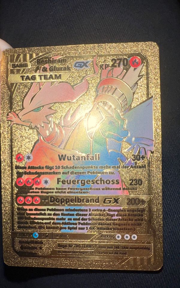 Reshiram und Glurak Pokémon Karte Gold Rainbow in Backnang