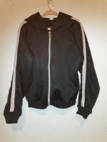 Trainingsjacke Gr 134 140 schwarz Glitzerstreifen Sachsen - Radebeul Vorschau