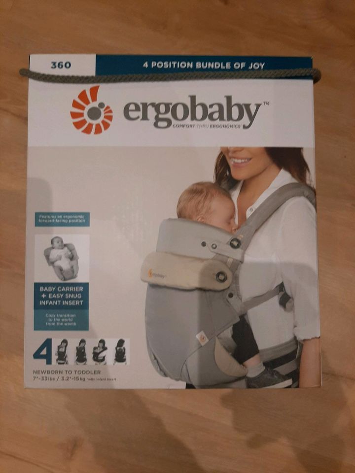 Ergobaby Babytrage mit Neugeborenenaufsatz in Bad Vilbel