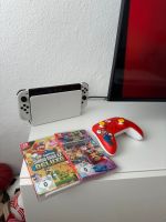 Nintendo Switch oled mit einem Spiel plus extra Controller. Nordrhein-Westfalen - Oberhausen Vorschau