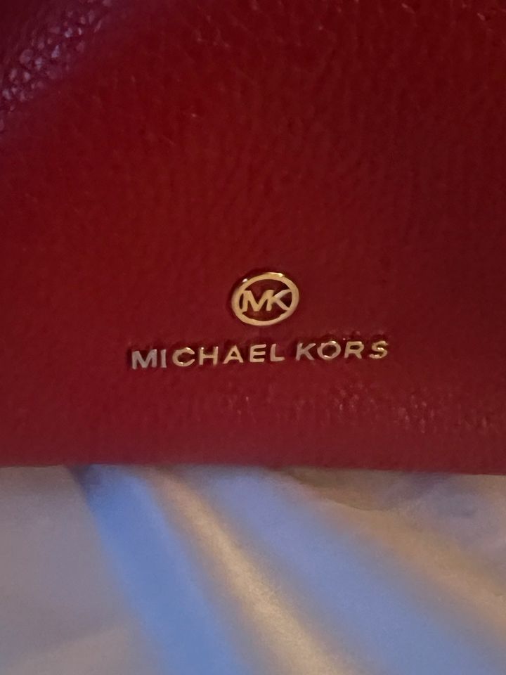 Neue Michael Kors rote Tragetasche mit Etikett in Köln