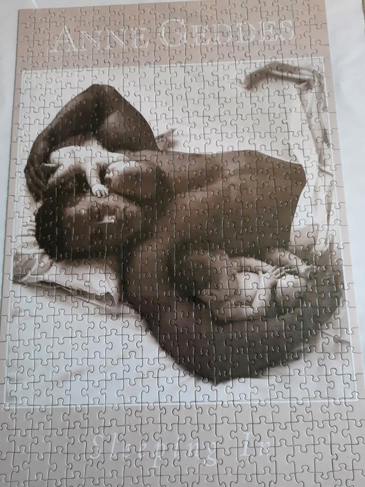 Anne Geddes Puzzle Mann mit Baby im Bilderrahmen in Bad Hersfeld