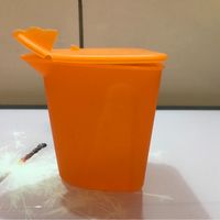 Tupperware Milchkännchen orange Niedersachsen - Rehden Vorschau