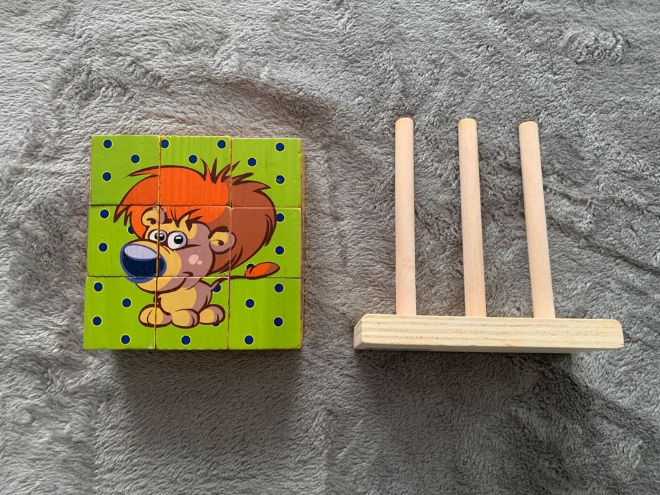 Holz Steck Puzzle Löwe Giraffe Zebra Schweinchen in Bad Saarow