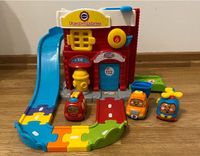 Tut Tut Baby Flitzer Feuerwehrhaus + 2 Fahrzeuge von vtech Schleswig-Holstein - Ammersbek Vorschau