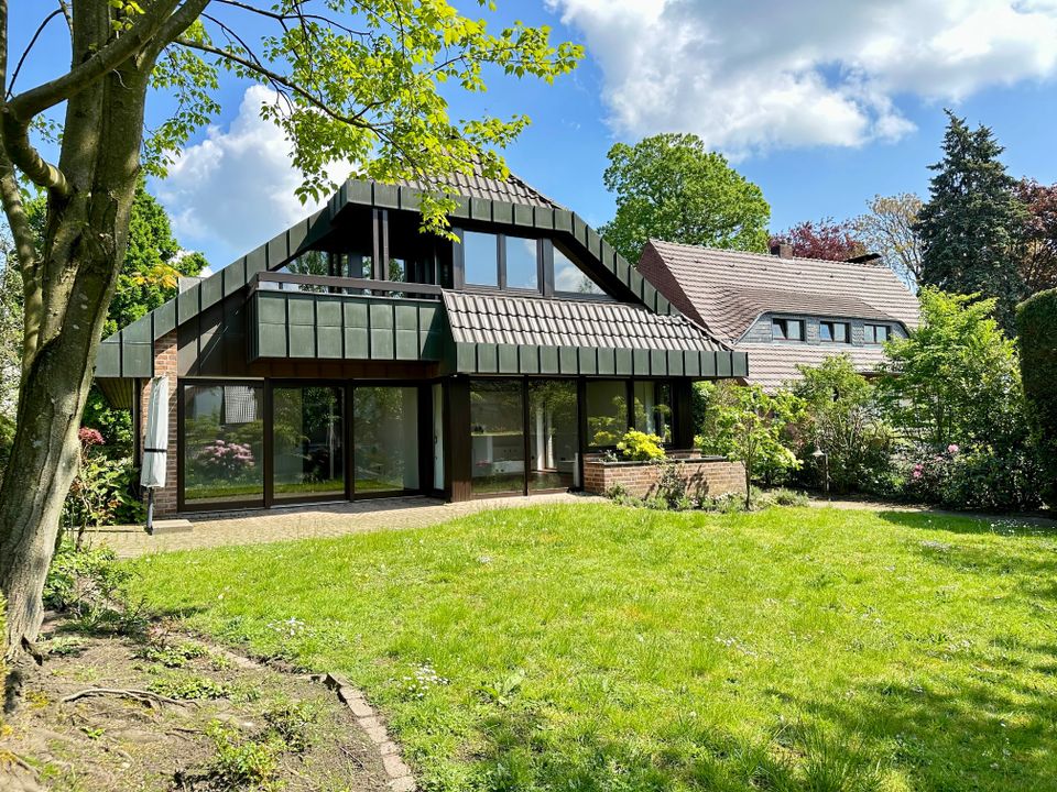 Moderne Eleganz und Grünoase mitten in Kleve:  Einfamilienhaus mit großzügiger Fensterfront und traumhaften Garten in Kleve