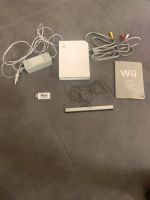 Eine Wii mit zugehörigen Kabeln, wie auch eine Anleitung Hessen - Wabern Vorschau