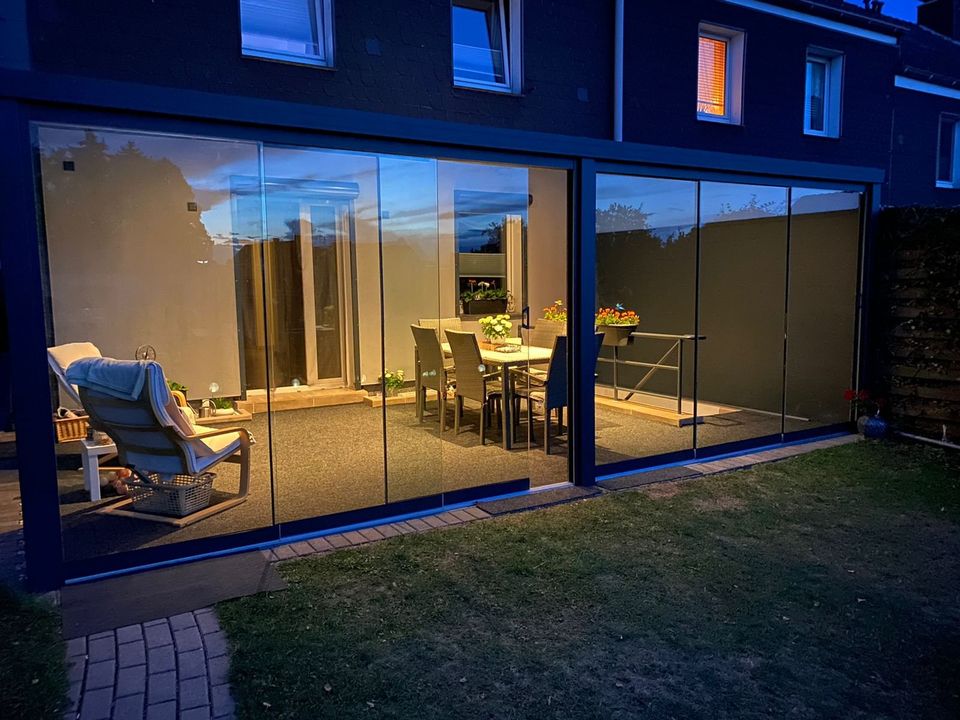 Wir montieren Terrassenüberdachung Glasschiebeelemente in Hilden