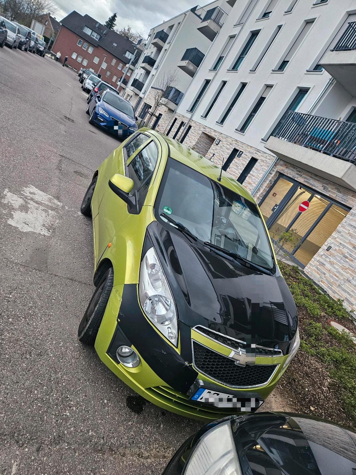 Abbildung des Autos Chevrolet Spark 2010 mit…
