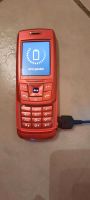 Defekt Handy Samsung SGH-E250i in metallischem rot. Nordrhein-Westfalen - Recklinghausen Vorschau