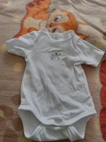 Baby unisex Body Kurzarm weiß Hund C&A Gr. 56 Niedersachsen - Pattensen Vorschau