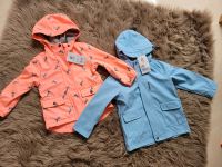 Neu Topolino Jacke Gr. 104 Regenjacke Kapuze neonorange blau Niedersachsen - Wetschen Vorschau