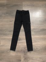 Mädchen Jeans s.Oliver schwarz Used-Look Gr. 146 (eher 134/140) Nordrhein-Westfalen - Dinslaken Vorschau