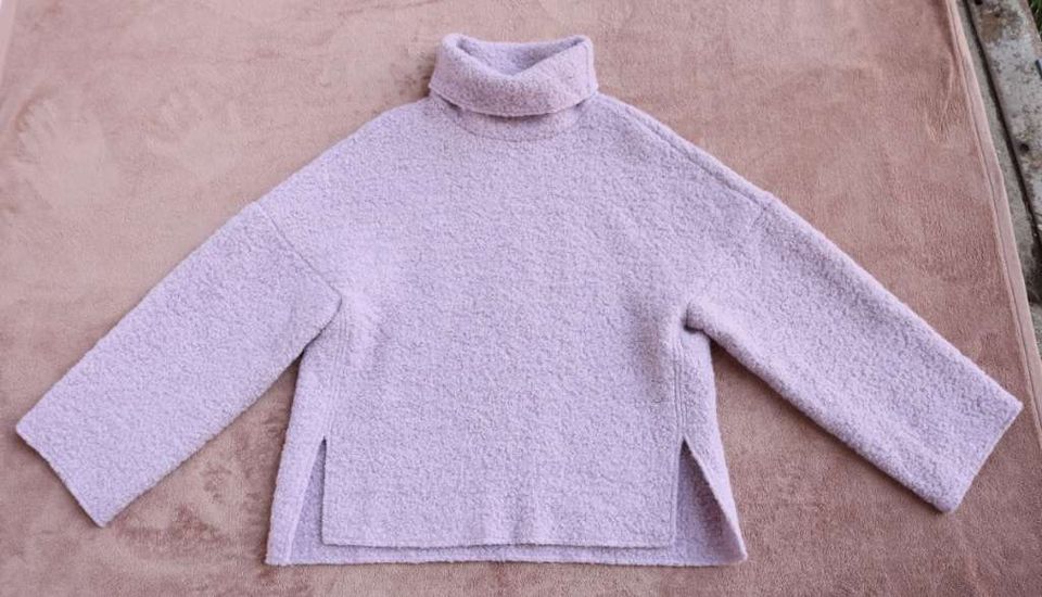 Gauchere Pullover aus Bouclé aus Wolle in München