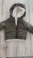 Baby Winterjacke Khaki olivgrün Größe 68 mit Kapuze Fell Hessen - Hainburg Vorschau