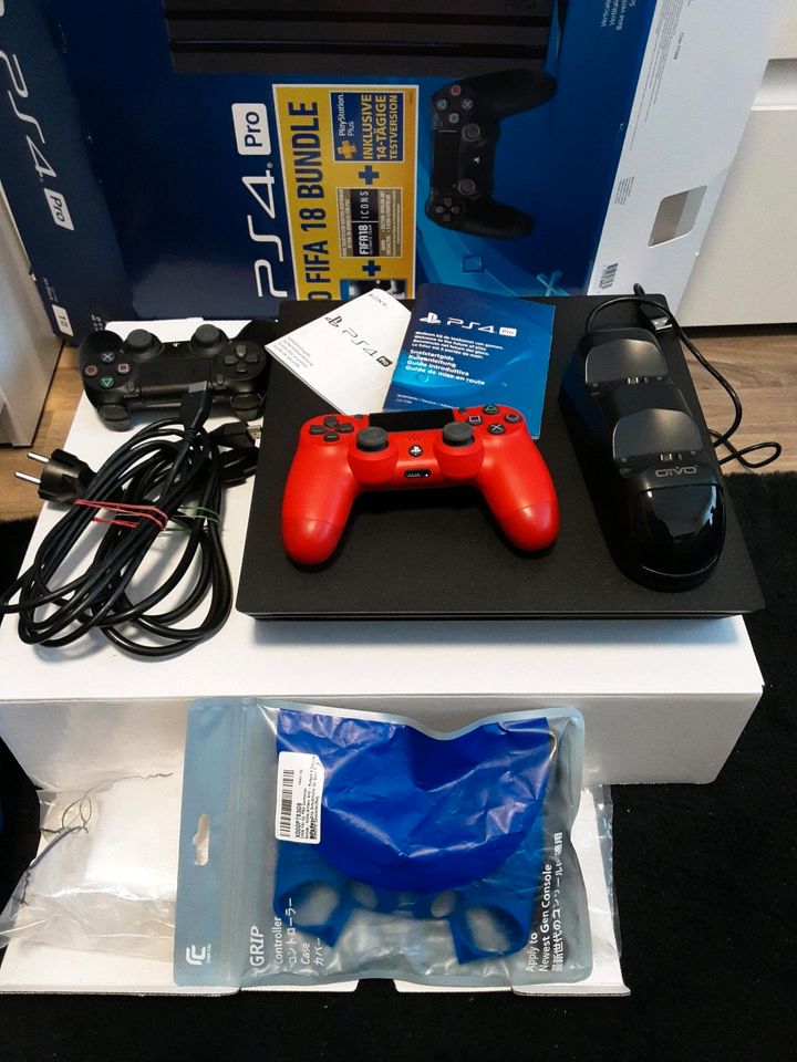 PS4 PRO 1TB mit 2 Controller und Ladestation und Zubehör in Frankfurt am Main