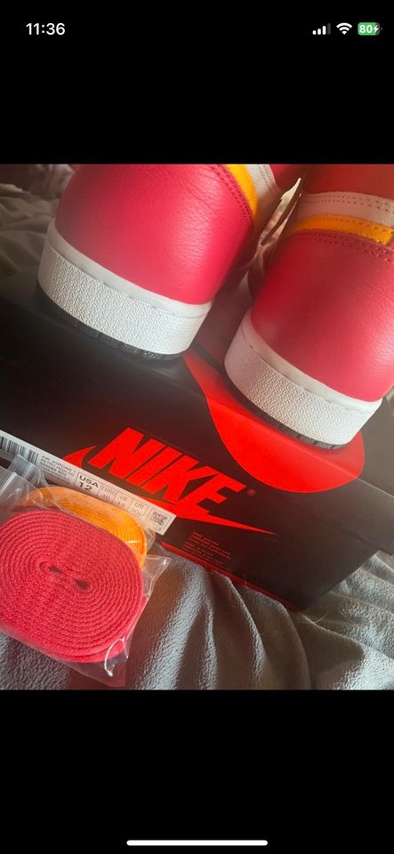 Jordan 1 Retro High OG Fusion Red in Worms