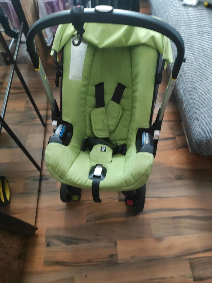 Originale doona Kinderwagen/Babyschale+ Zubehör in Werdau