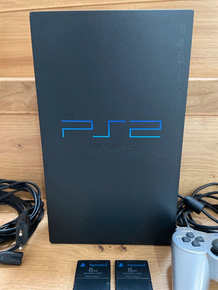 Playstation 2 mit Zubehör wie Singstar und Buzz! in Bad Wildungen