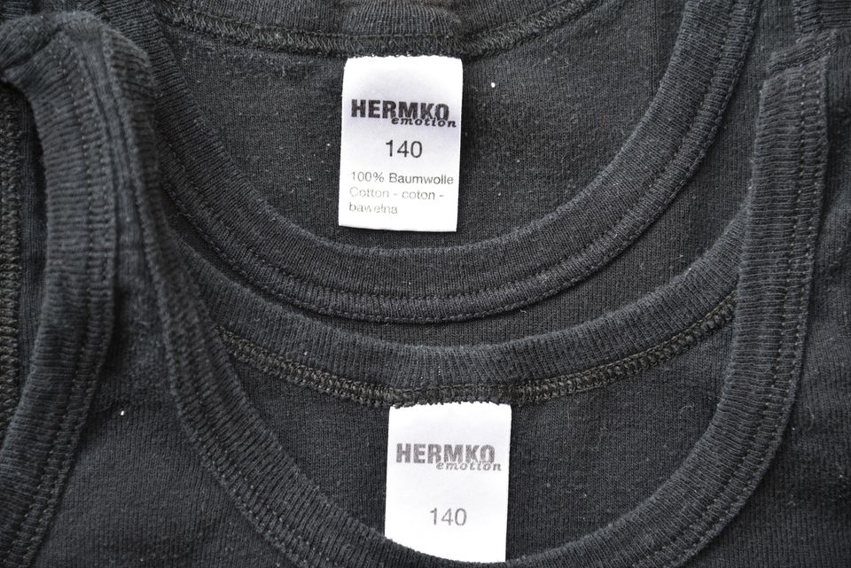 Set: HERMKO Unterhemd Gr. 134, schwarz, 4 Stück, Jungen in Eslohe