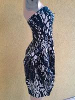 Kleid schwarz/weiß Gr.38 von Amisu mit schwarzen Schmucksteinen Berlin - Hellersdorf Vorschau