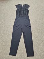 Jumpsuit Esprit schwarz Spitze Gr. 38 Brandenburg - Rathenow Vorschau