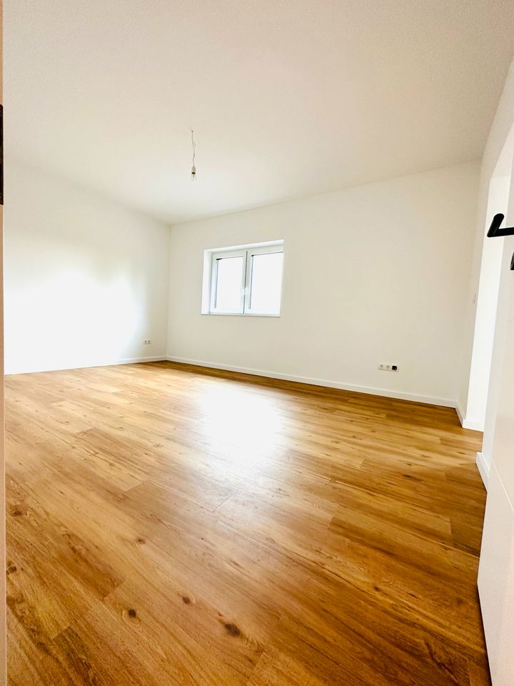 Haus zur Miete 155m² Neubau 5,5 Zimmer KfW55 Wärmepumpe mit 2 Bäder Carport Garten Nienburg Haßbergen in Haßbergen