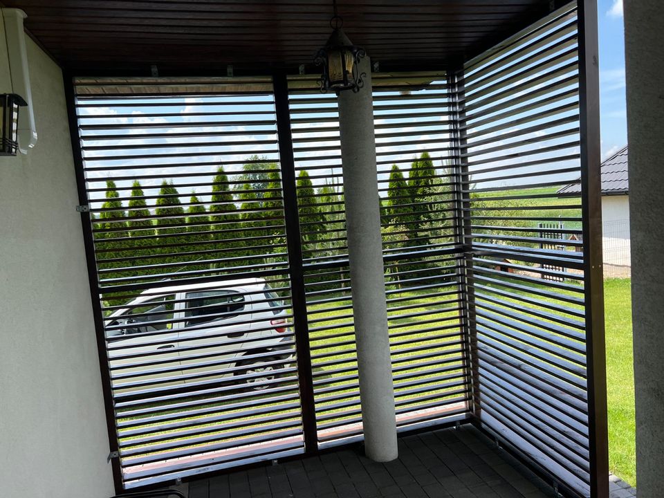 Jalousien Terrassenbeschattung Terrasse aus Holz Sonnenschutz in Stade
