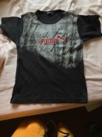 Schwarzes T-Shirt mit rotem Puma. Gr. 140 Berlin - Wilmersdorf Vorschau