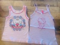 2x Unterhemden/Tops/ärmellose Shirts Gr.98/104  Hello Kitty Mecklenburg-Vorpommern - Gnoien Vorschau