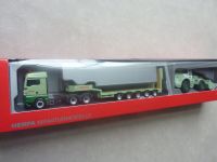 Herpa GEIGER MAN TGX XLX E6 6×4 Tieflade-Sz mit Radlader 946759 Schleswig-Holstein - Bornhöved Vorschau