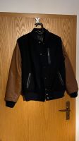 Collegejacke Nike Lederärmel schwarz braun Brandenburg - Finsterwalde Vorschau