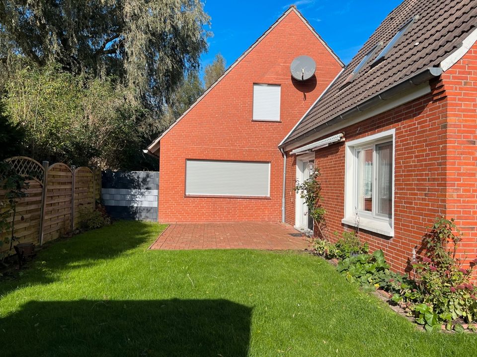 Ihr Ruhepol in Greetsiel: Modernisierte Doppelhaushälfte mit Garten, Carport und Garage in Greetsiel