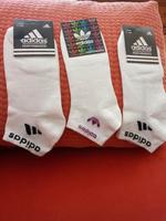 Socken Adidas schwarz 2x41-45 Lila 1x35-39 Niedersachsen - Wunstorf Vorschau