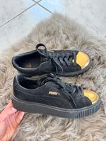 Schwarze Puma Sneaker mit goldener Kappe Saarland - Homburg Vorschau