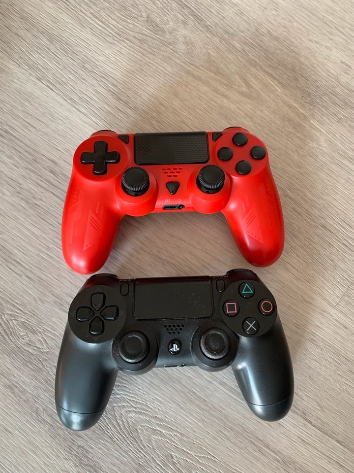 PS4 Konsole mit Controller und Spielen in Ebsdorfergrund